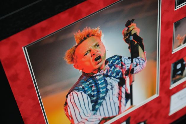 Sex Pistol's Johnny Rotten Signed White Card Display - Memorabilia Framers Shop